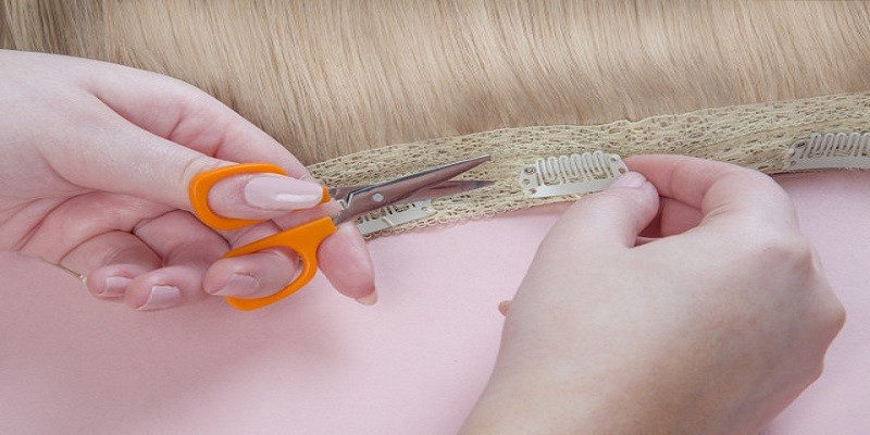 You are currently viewing How To Sew Clips To Hair Extensions?